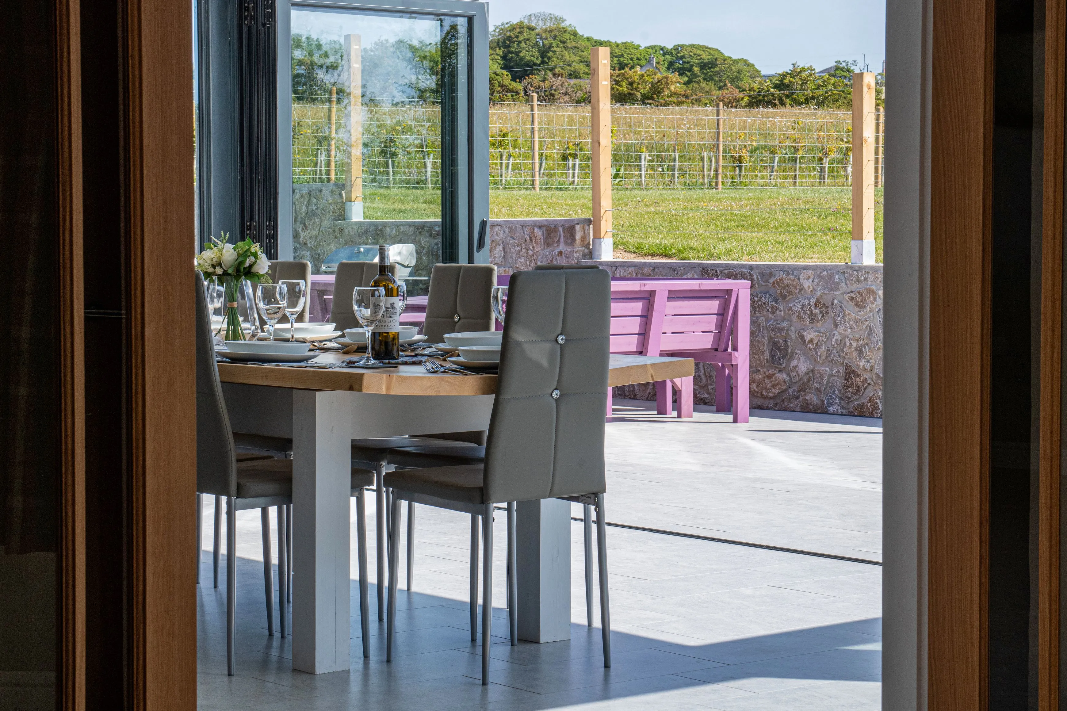 Ty Rhos Newydd Dining table and outdoor patio