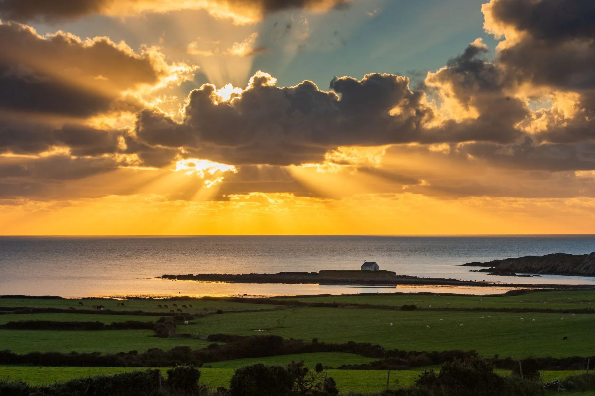 Sunset at church in the sea