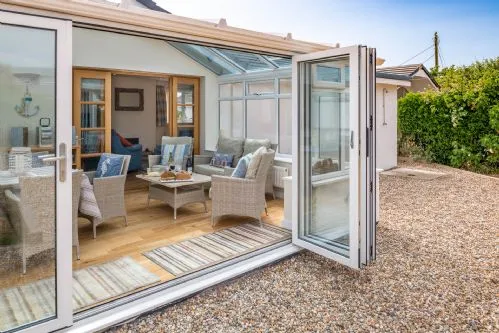 Chelford Garden looking in to Conservatory - Rhosneigr