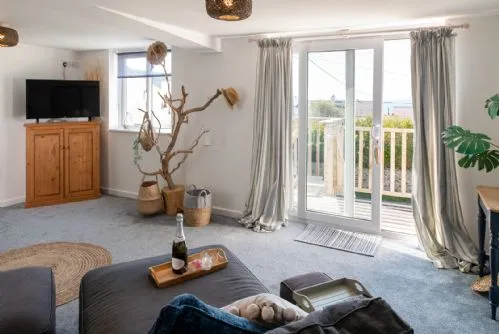 Driftwood second living room with raised terrace
