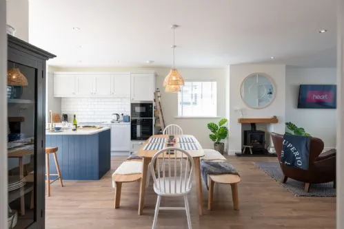 Off the Hook - Dining table and TV