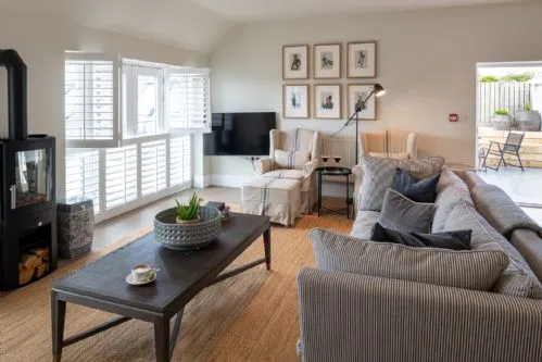 The Nest at The White Eagle - living room sofa and tv