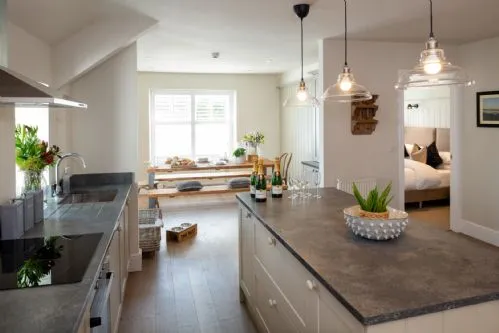 The Nest at The White Eagle - kitchen island, dining area