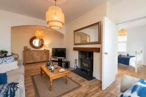 Bryn Awel Bach Living room with bedroom shot