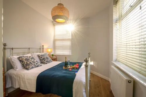 Bryn Awel Bach master bedroom glowing