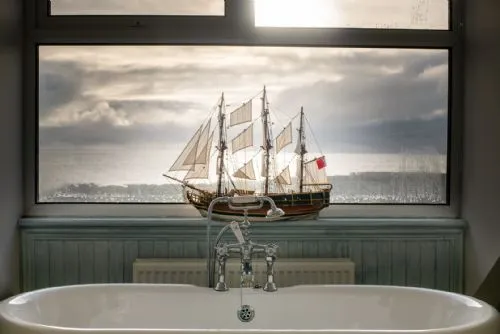 White Cottage Quad Room Bathroom View