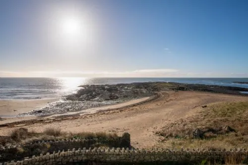 White Cottage Beach from Garden