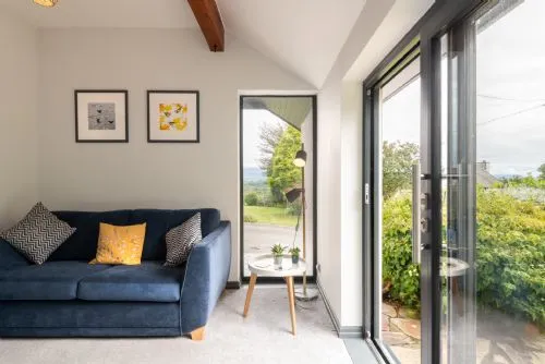 Penyrorsedd - Patio doors and sofa
