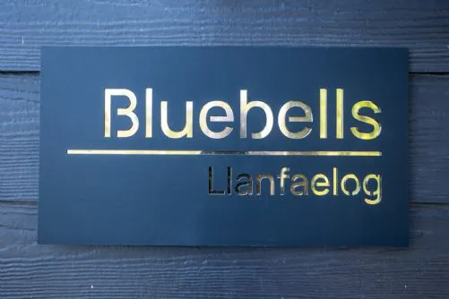 Bluebells Llanfaelog - House sign