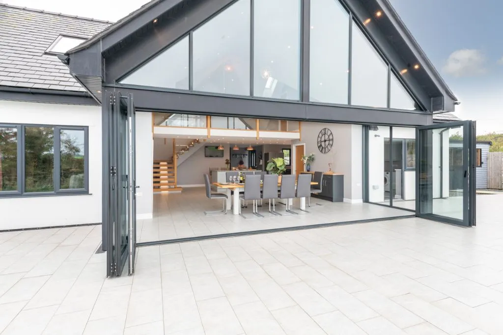 Ty Rhos Newydd Outdide looking into Open Plan space